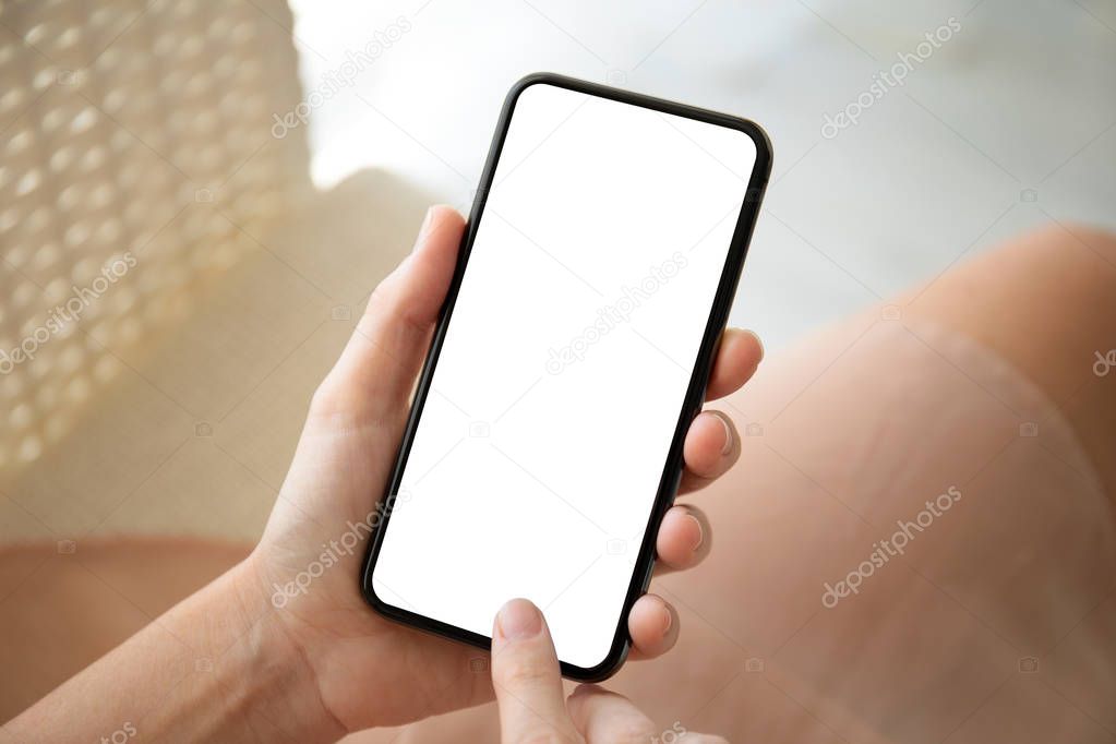 female hands holding phone with isolated screen