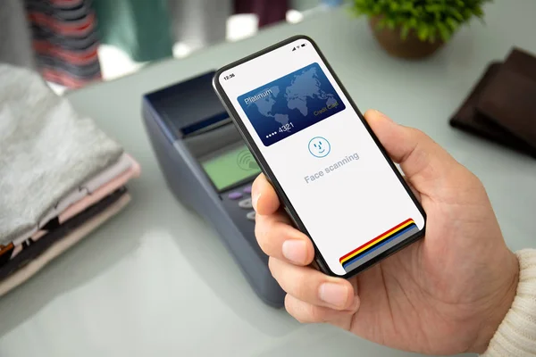 phone face scanning id payment purchase on paypass online termin