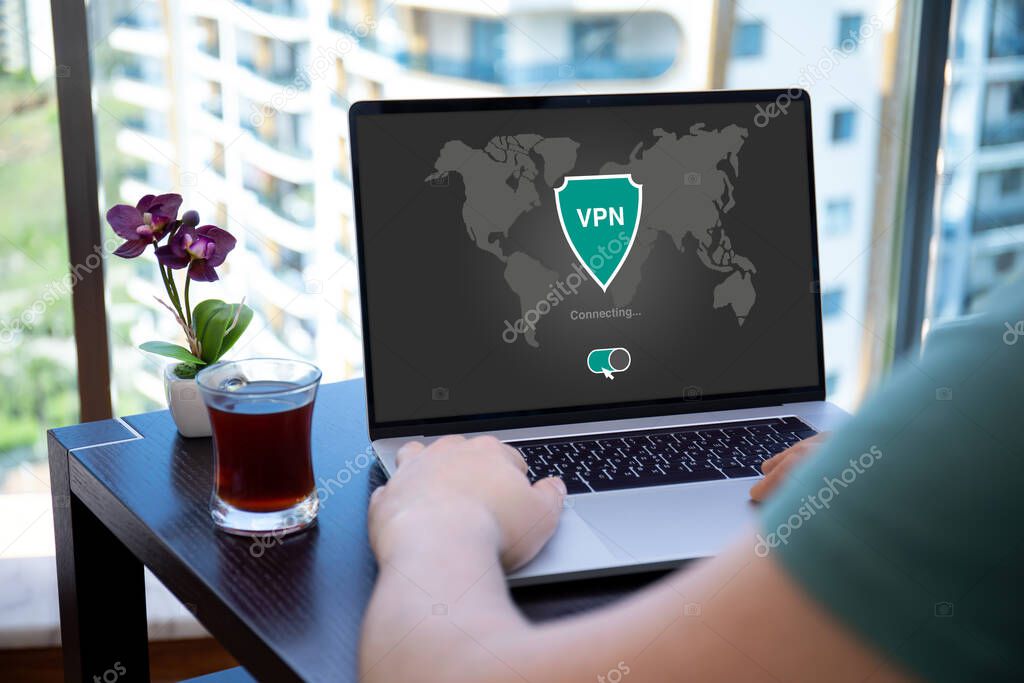 man uses app vpn creation Internet protocols for protection private network on screen computer lapto