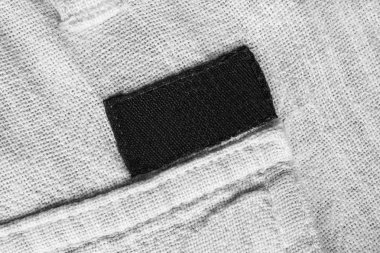 Beyaz Tekstil arka plan closeup karesinde boş siyah tekstil