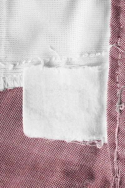 Etiqueta Ropa Textil Blanca Blanco Sobre Fondo Algodón Rosa — Foto de Stock