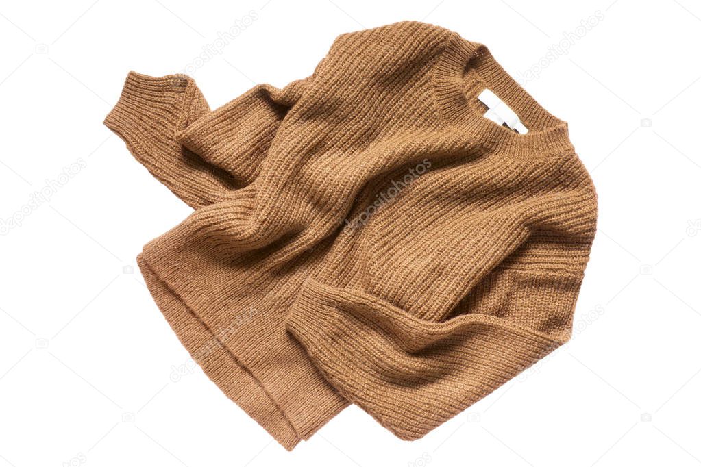 Crumpled brown wool sweater isolated over white