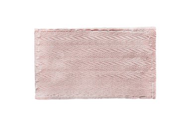 Beyaz üzerine izole edilmiş boş pembe tekstil yaması
