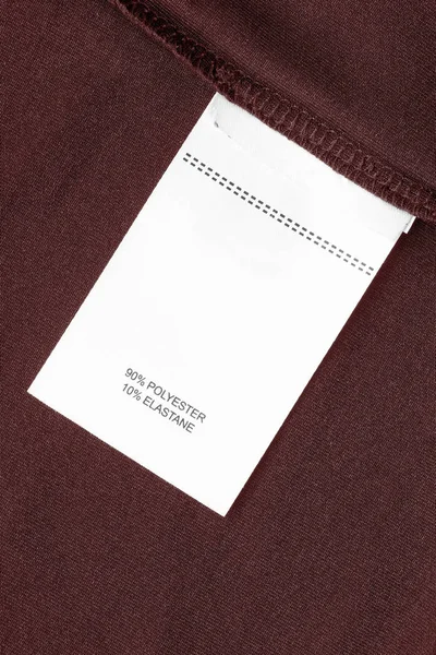 Composición Etiqueta Ropa Sobre Fondo Textil Marrón Primer Plano — Foto de Stock