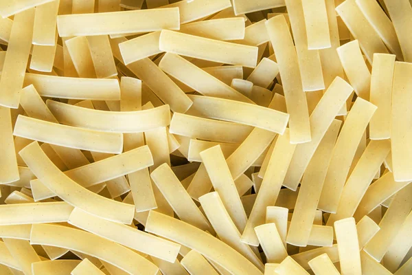 Een Heleboel Gouden Pasta Eten Close Als Achtergrond — Stockfoto