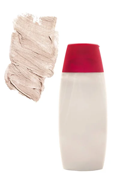 瓷米色遮阳瓶和奶油涂片在白色背景 — 图库照片