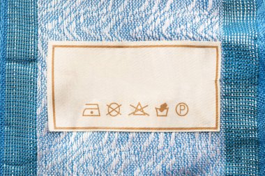 Mavi Tekstil arka plan closeup bakım kıyafet etikette