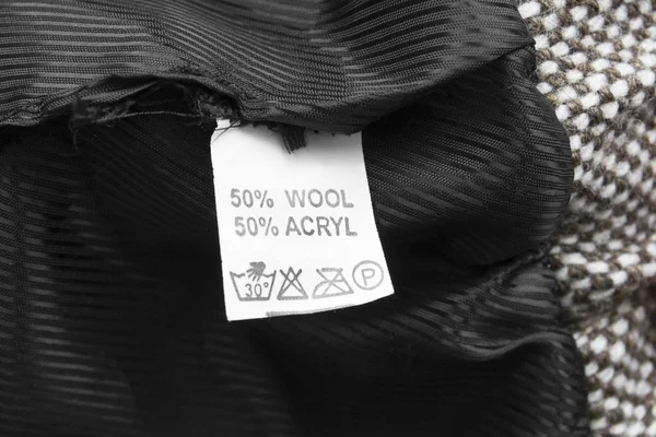 Composición Cuidado Etiqueta Ropa Sobre Fondo Textil — Foto de Stock