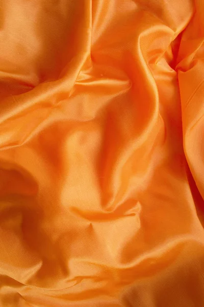 Leuchtend Orange Zerknüllter Satin Als Hintergrund — Stockfoto