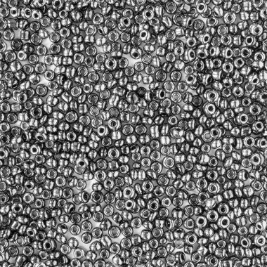 Arkaplan olarak siyah metalik boncukların kusursuz dokusu