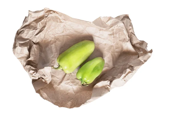 Pair Green Bell Peppers Wrapped Craft Paper Isolated White — Stock Photo, Image