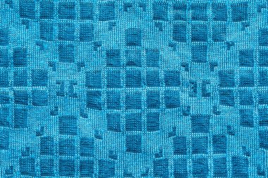 Kusursuz mavi örgü dokusu arkaplan olarak yakın plan