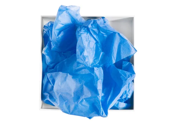 Verfrommeld Blauw Inpakpapier Een Doos Geïsoleerd Boven Wit — Stockfoto