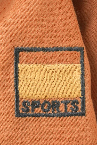 Marcos Bordados Deportes Palabras Sobre Fondo Textil Naranja — Foto de Stock