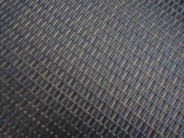 Plastik örgü arka plan bambu gibi görünüyor.