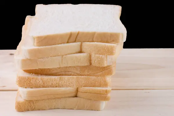 Pane integrale su tavola di legno — Foto Stock