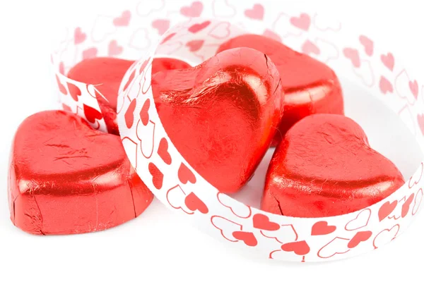 Chocolate candy red heart with ribbon — Stock Photo, Image