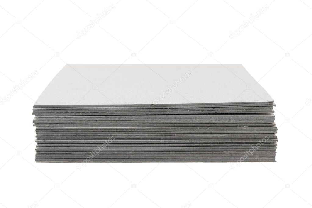 close-up of stack gray cardboard on white background