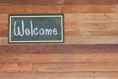 Ahşap çerçeve Eski ahşap arka planda hoş geldiniz