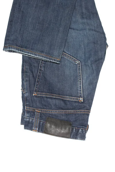 Jeans blu piegati — Foto Stock