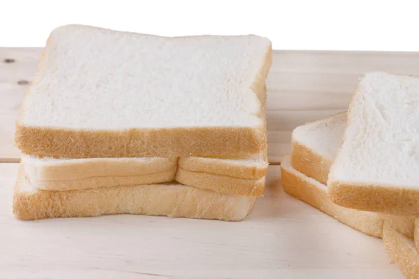 Pane integrale su tavola di legno . — Foto Stock