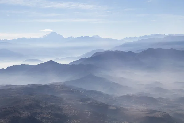 Misty blue Andean mountain landscape background — Stock Photo, Image