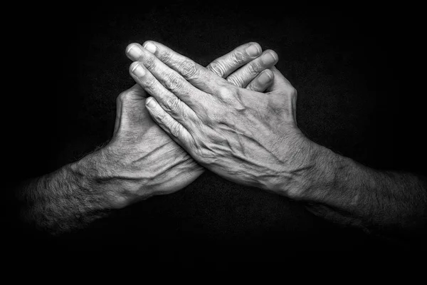 Black White Photo Crossed Man Hands Dark Background Symbolizing Protection — Stock Photo, Image