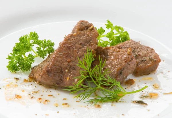 Slices Fried Beef White Plate Decorated Greens Parsley Dill — Stock Photo, Image