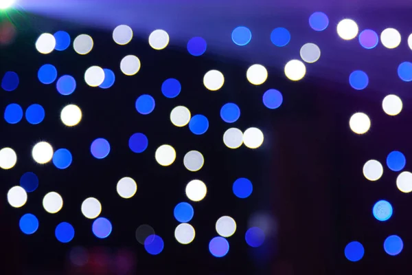 Mavi ve beyaz bokeh renkleri siyah arka plan üzerine bir gece kulübü-Avustralya