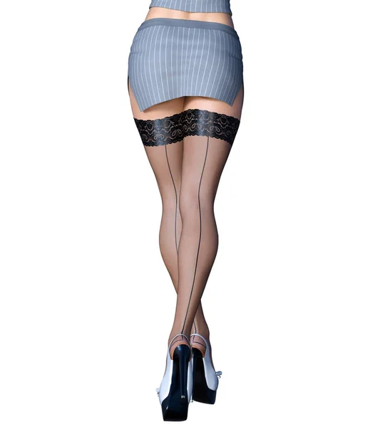 Långa smala sexiga ben kvinna kort kjol Strumpor. — Stockfoto