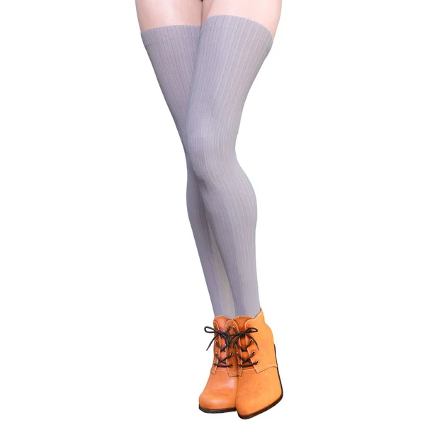 Vackra kvinnliga ben ull leggings och halv pärlor. — Stockfoto