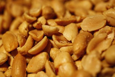 Fırında fıstık aperatifler arka plan. Yararlı yağlar. Doku somun. Seçici odak.