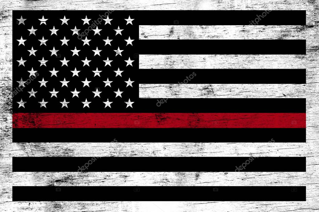 A firefighter support flag stained over a weathered white wooden background.