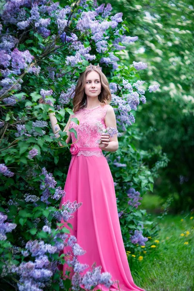 Woman, russian model in spring lilac park