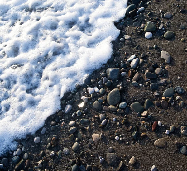 Pebble background, sea rock texture