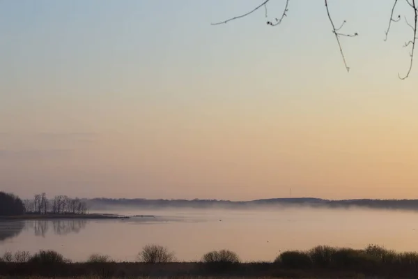 Wisconsin countryside under fog, sunrise spring,  morning sun