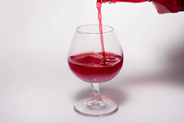 Glass Goblet Red Drink White Background Splash Liquid Bottle Minimalism — Stock Photo, Image