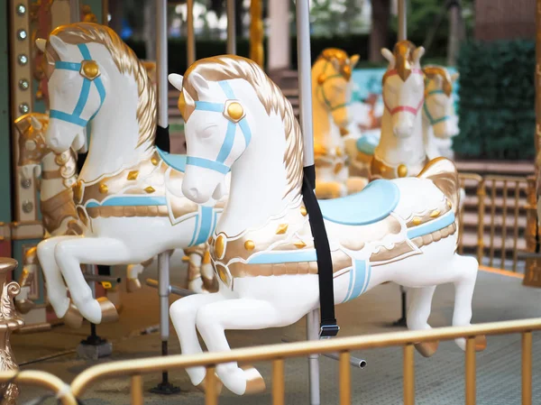 colorful carousel horse in theme park