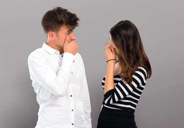 Young Couple Covering Mouth Hands — Stock Photo, Image