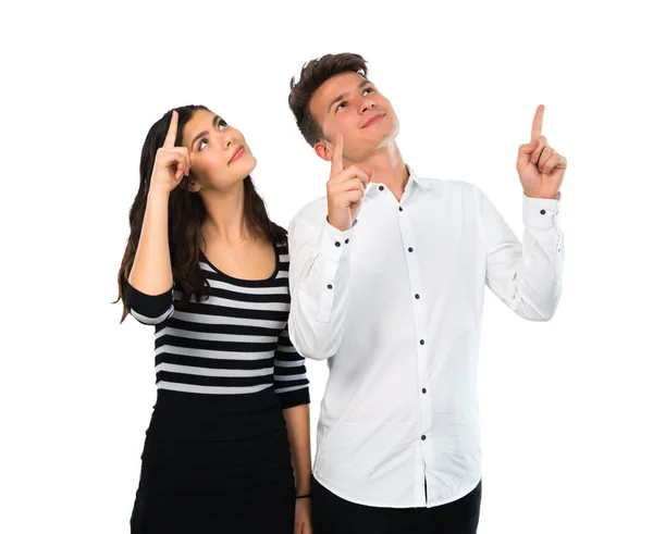 Young Couple Pointing Index Finger Great Idea Isolated White Background — Stock Photo, Image