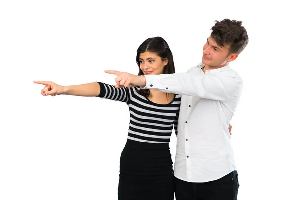 Young Couple Pointing Finger Side Presenting Product Isolated White Background — Stock Photo, Image