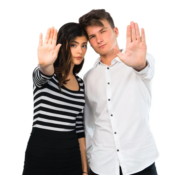 Young Couple Making Stop Gesture Her Hand Isolated White Background — Stock Photo, Image