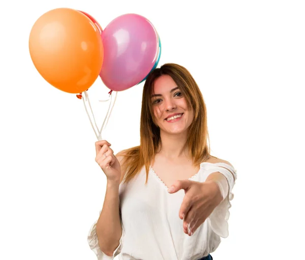 Hermosa Joven Sosteniendo Globo Haciendo Trato — Foto de Stock