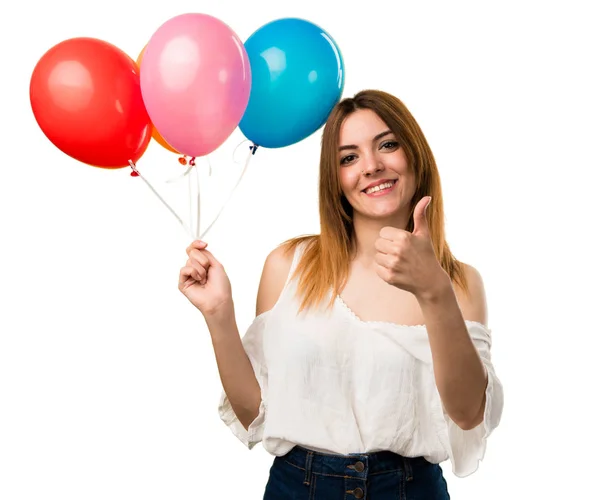 Hermosa Joven Sosteniendo Globo Con Pulgar Hacia Arriba — Foto de Stock