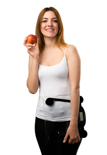 Vacker Ung Flicka Med Väger Maskinen Och Ett Äpple — Stockfoto