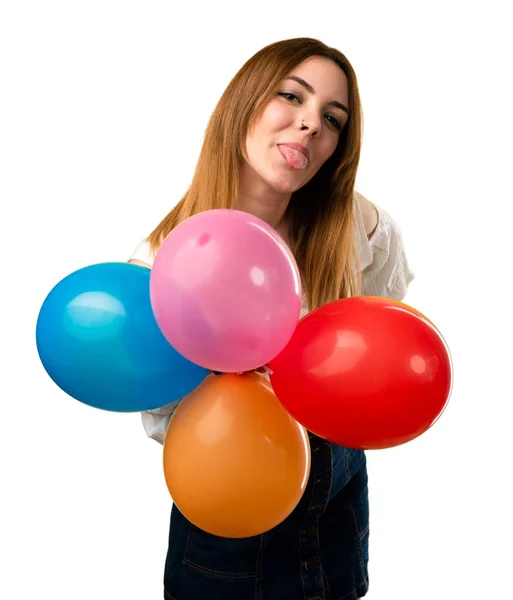 Schönes Junges Mädchen Das Einen Luftballon Hält Und Ihre Zunge — Stockfoto