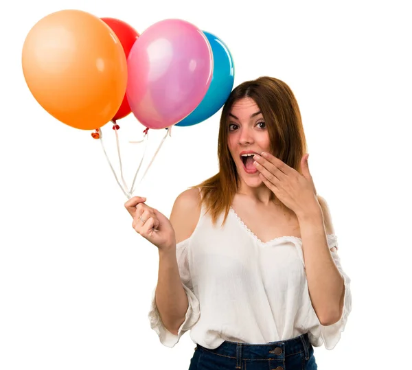 Hermosa Joven Sosteniendo Globo Haciendo Gesto Sorpresa — Foto de Stock