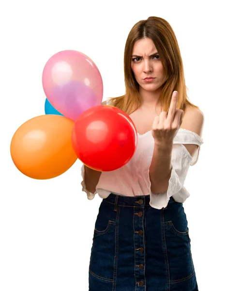 Beautiful Young Girl Holding Balloon Making Horn Gesture Stock Picture