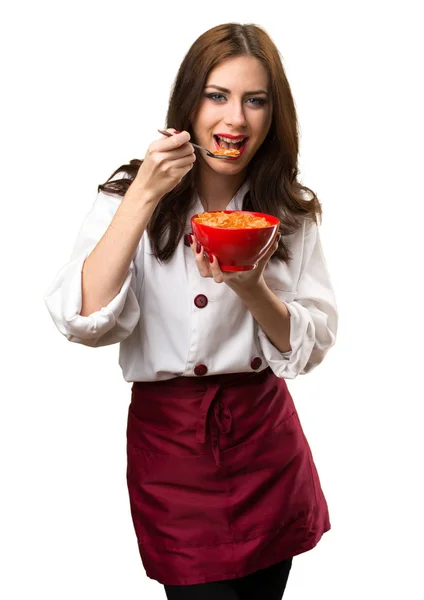 Beautiful Chef Woman Eating Cereals Bowl — Stock Photo, Image