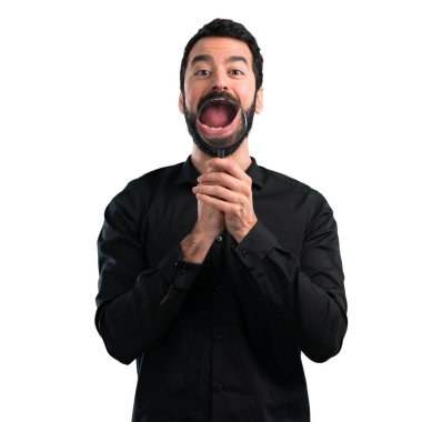 Beyaz arka plan üzerinde büyüteç ile sakallı yakışıklı adam